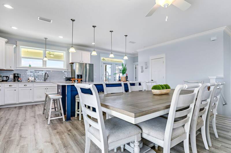 Dining table for the whole group beside the kitchen
